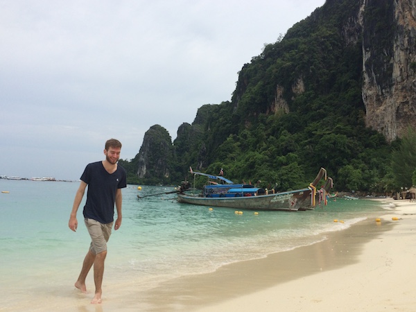 Elliott Killian in Koh Phi Phi island Thailand. He is walking on the beach 